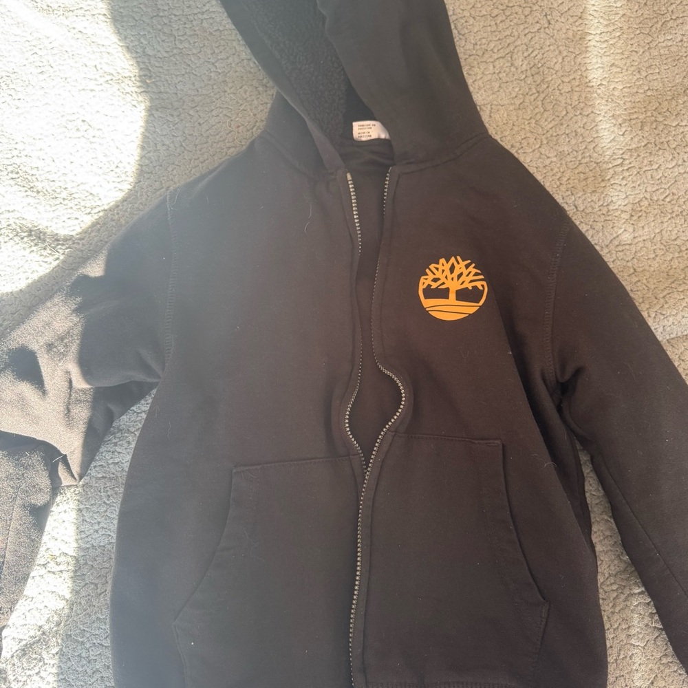 WONDERLAND Black Hoodie with Gold Emblem